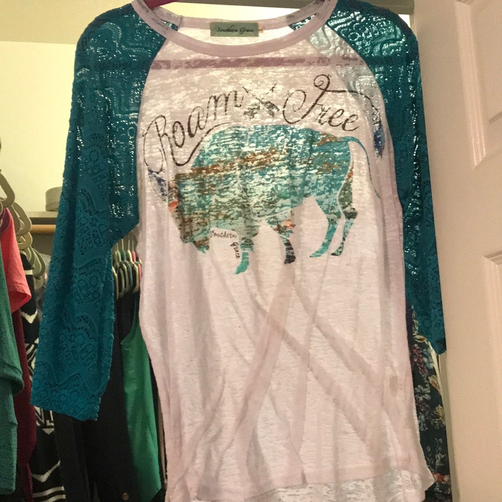 White tee with teal lace sleeves